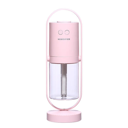 Portable pink smart home cool mist humidifier showing function keys and adjustable stand details.