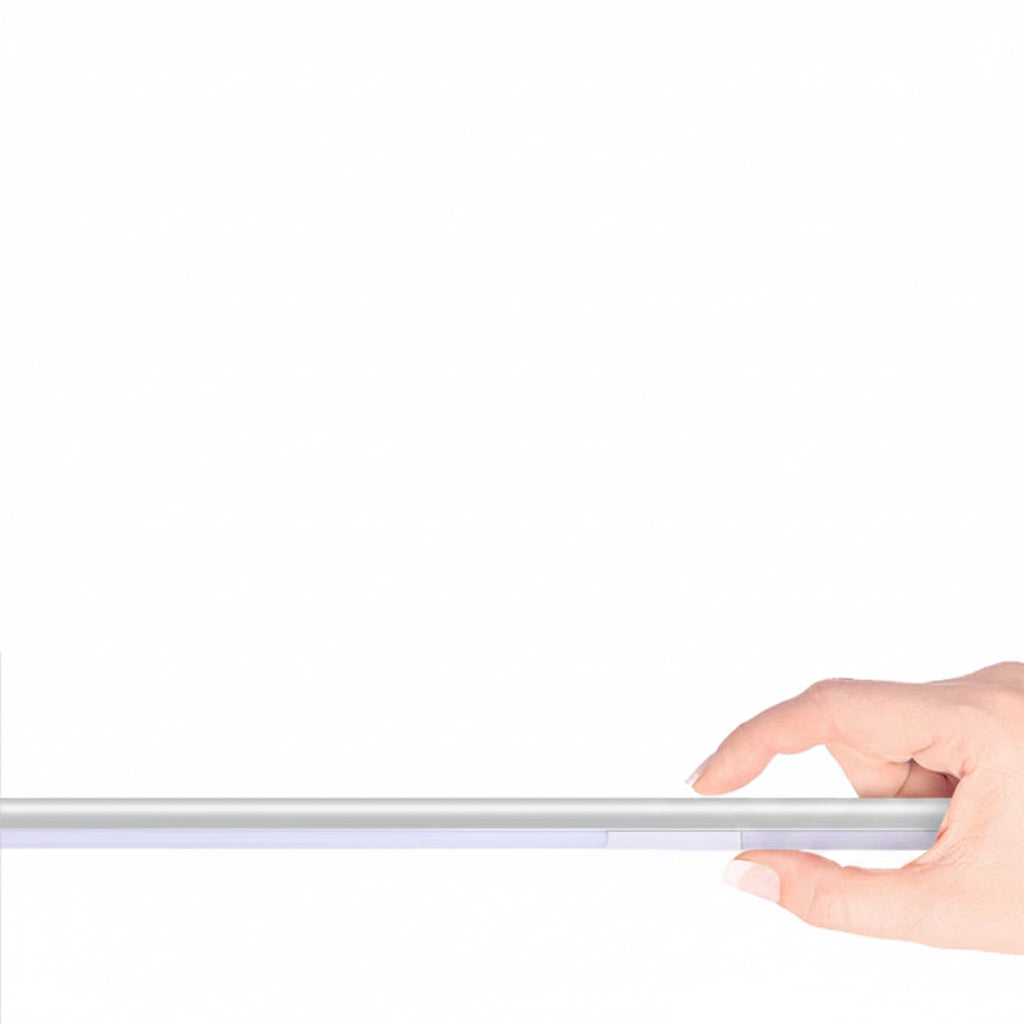 Induction lamp with ultra-thin design held by a hand on a white background