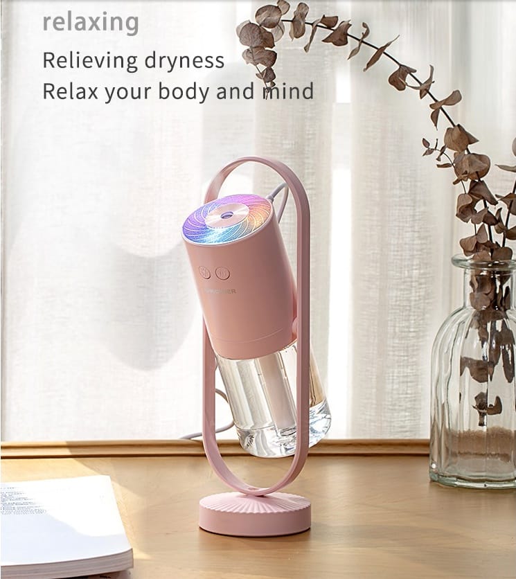 Portable smart home aromatherapy humidifier with color LED light and text for relieving dry air.