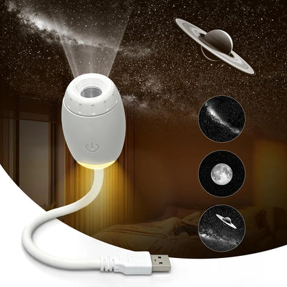 White night light projector with USB cable on a dark background with celestial designs.